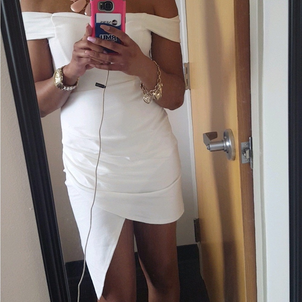 A off white off shoulder dress.